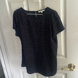 Blue blouse with pink and white design